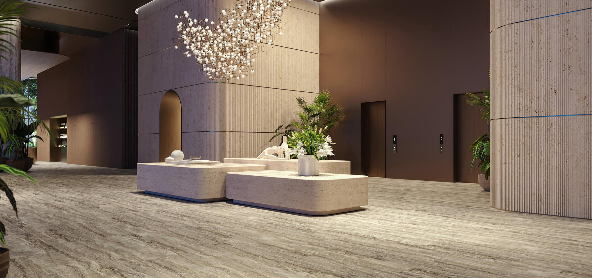 Two-story soaring atrium with lush planting and serene seating areas